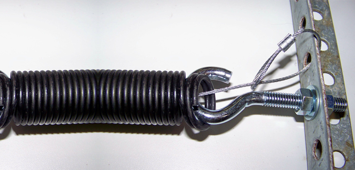garage door safety spring repair in Piru
